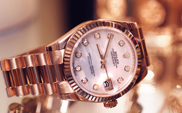 close rose gold rolex watch