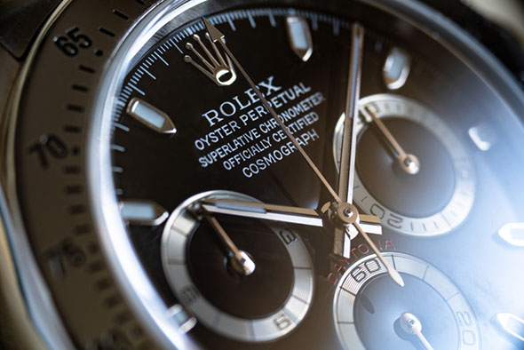 closeup rolex daytona watch face