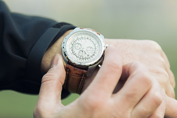 hand with an elegant expensive watch