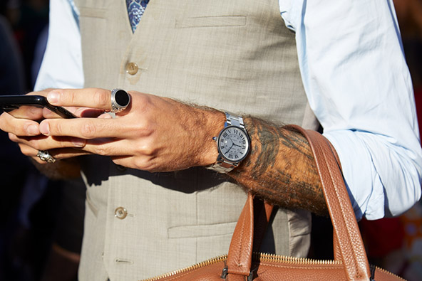 Man with Cartier watch